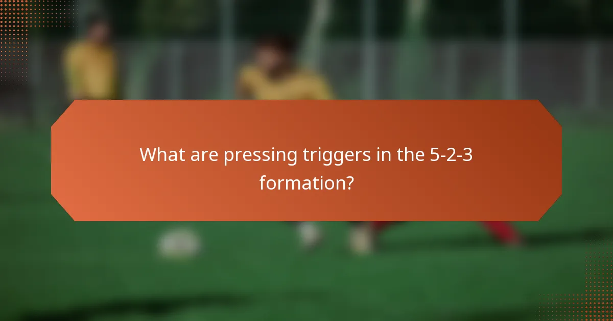 What are pressing triggers in the 5-2-3 formation?