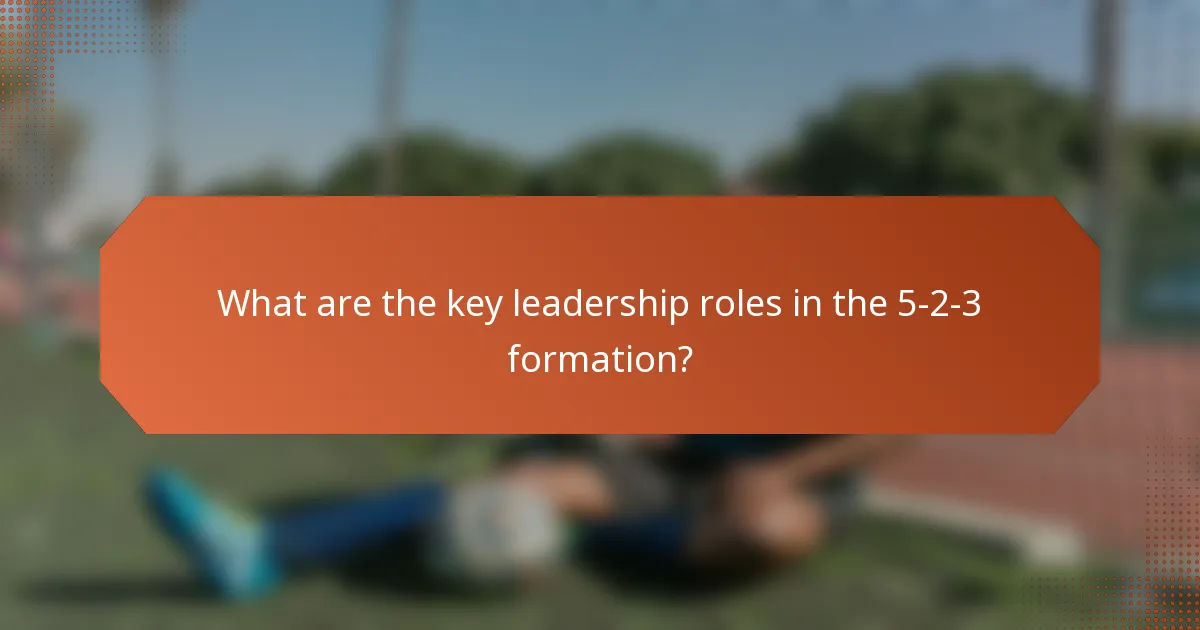 What are the key leadership roles in the 5-2-3 formation?